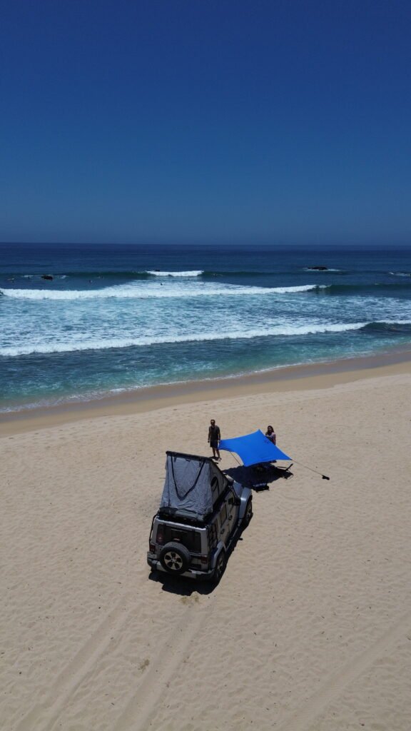 Surfboards on pristine beach at ALAIA Surf Lodge, direct access to La Fortuna surf Baja California