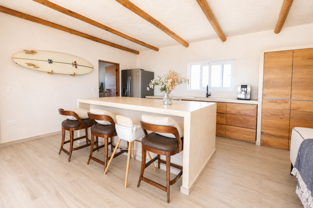 Kitchen island and dining area in The Villa